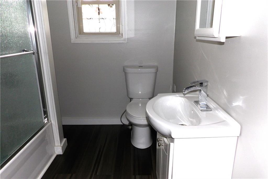 3067 Hadley Road Hadley, PA 16130 - Photo 8 of 18 a bathroom with a sink and a toilet