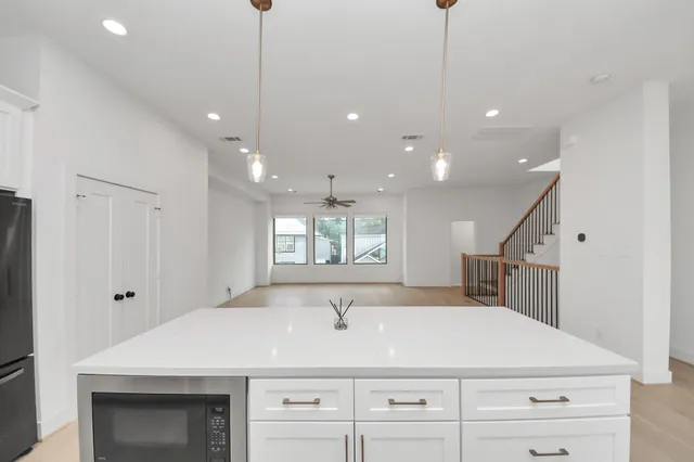 a view of a center island and a window in a room