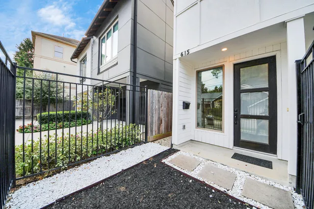 a view of a house with a garden