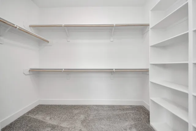 a view of an empty walk in closet