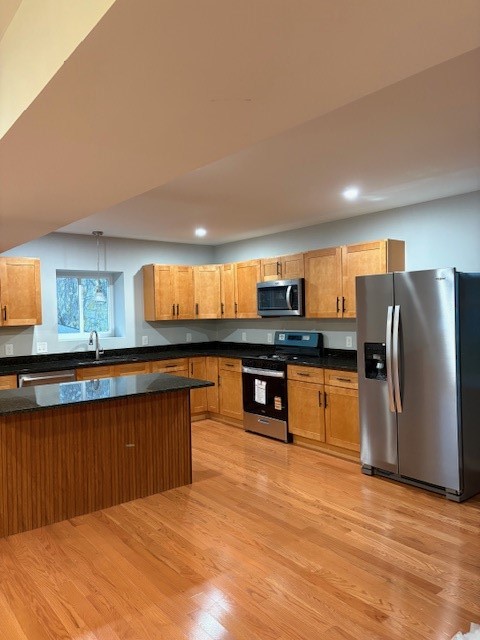 184 Avenue C, Unit S6 Woonsocket, RI 02895 - Photo 5 of 15 Kitchen with stainless steel appliances.