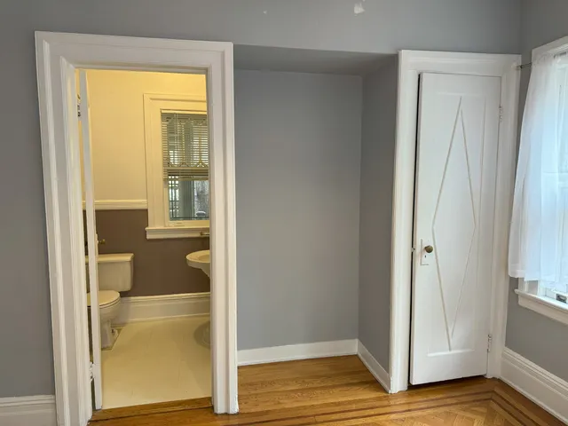 a view of a bathroom with a glass door