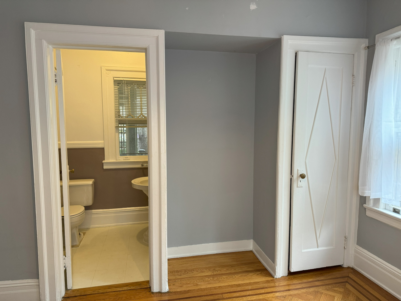 2024 Glenwood Road Brooklyn, NY 11210 - Photo 12 of 13 a view of a bathroom with a glass door