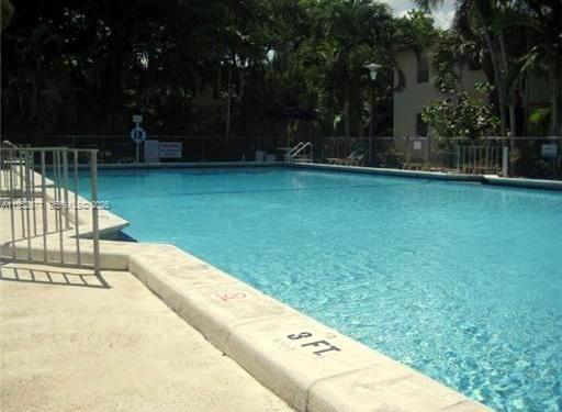 7840 Southwest 55th Avenue, Unit 22A Miami, FL 33143 - Photo 11 of 16 a view of swimming pool