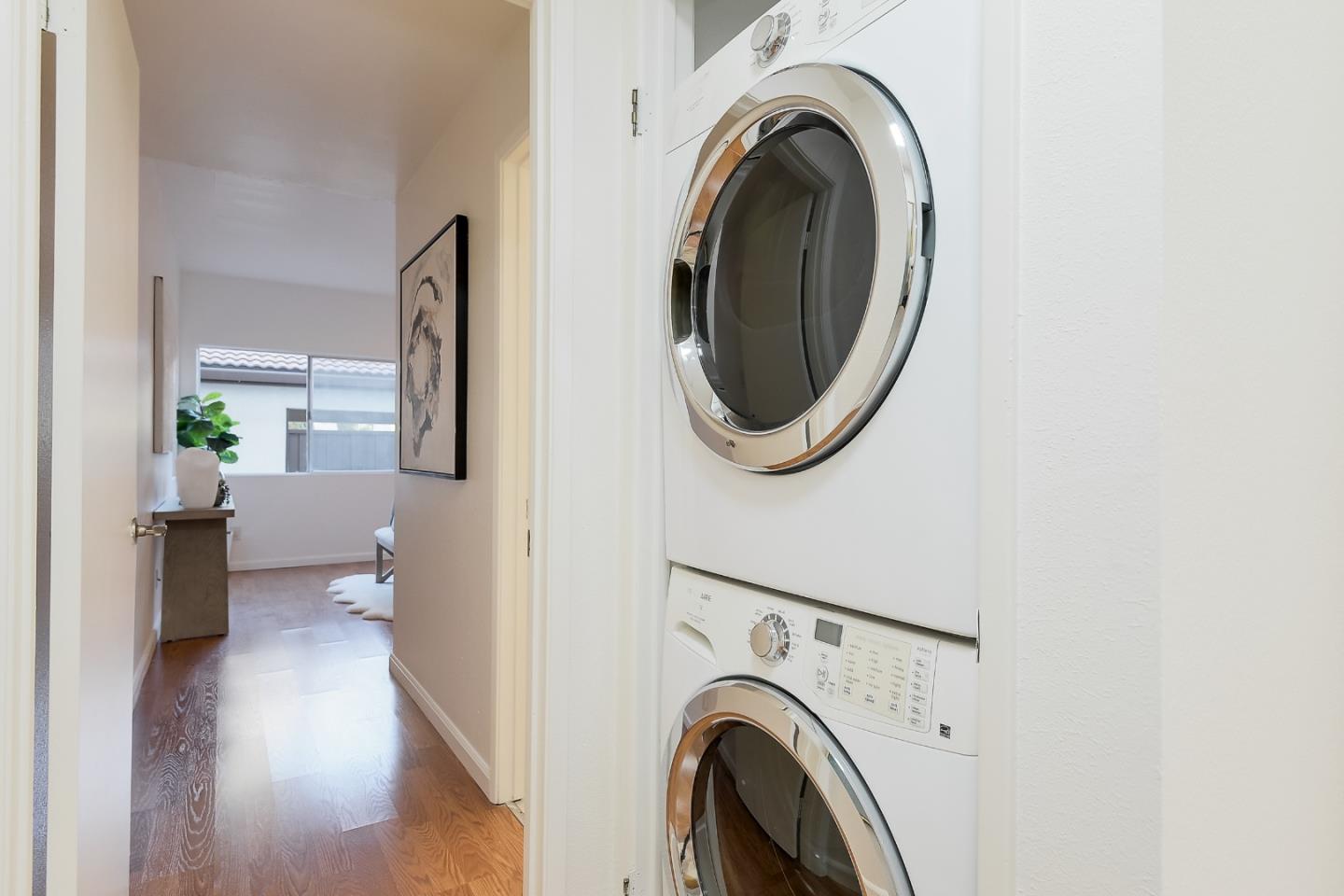 1400 Bowe Avenue, Unit 302 Santa Clara, CA 95051 - Photo 12 of 16 a view of a hallway with washer and dryer
