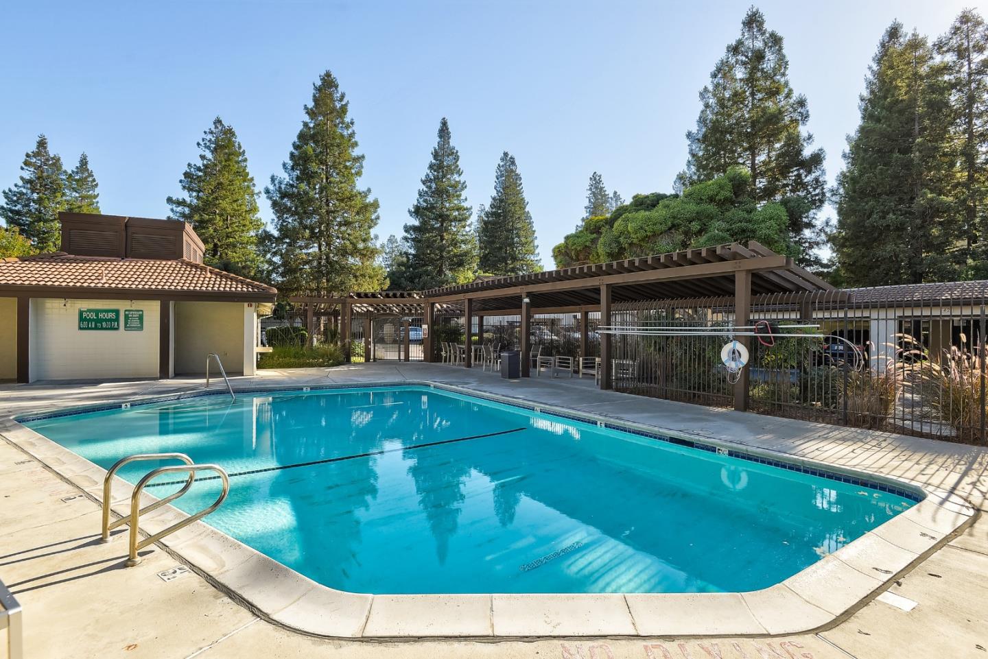 1400 Bowe Avenue, Unit 302 Santa Clara, CA 95051 - Photo 15 of 16 a view of a swimming pool with a patio