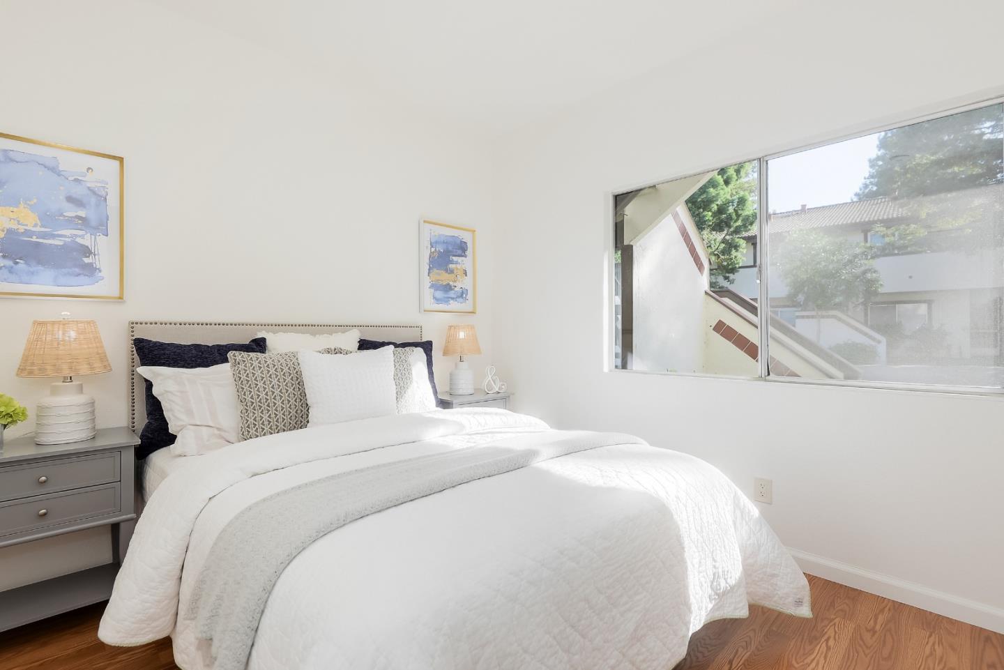1400 Bowe Avenue, Unit 302 Santa Clara, CA 95051 - Photo 10 of 16 a bedroom with bed and window