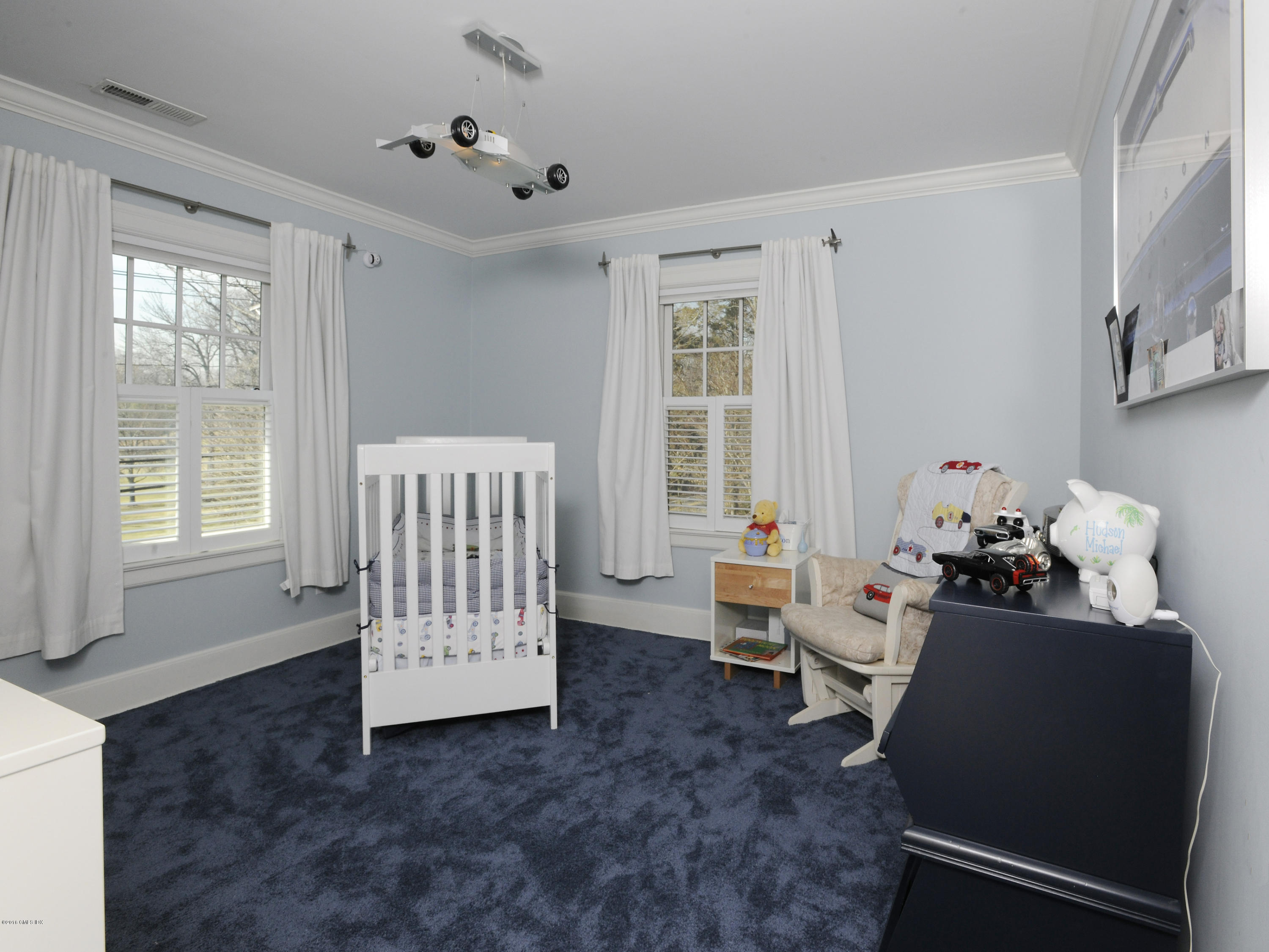 63 Indian Field Road Greenwich, CT 06830 - Photo 23 of 37 a living room with furniture and windows
