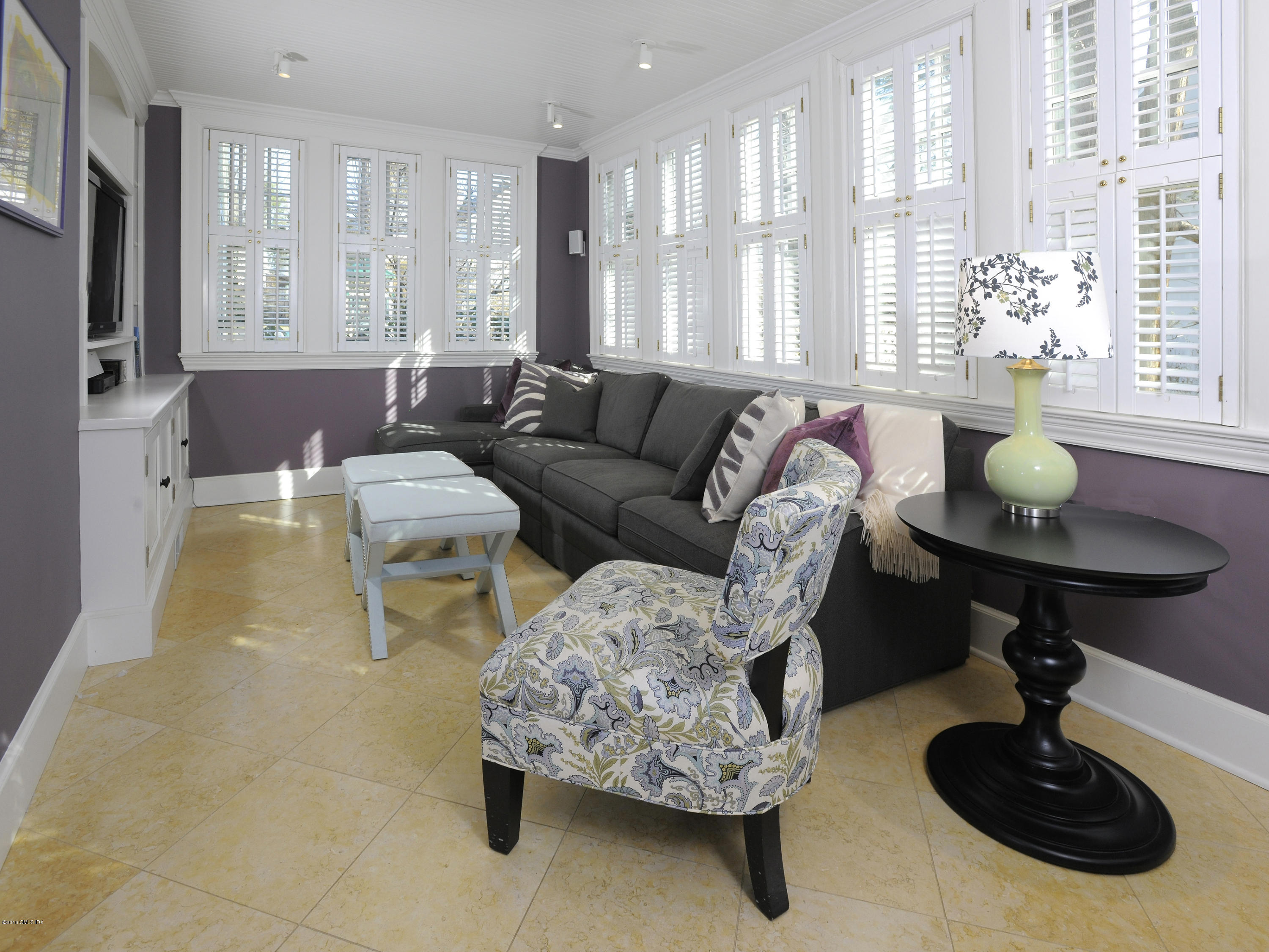 63 Indian Field Road Greenwich, CT 06830 - Photo 7 of 37 a living room with furniture and a large window