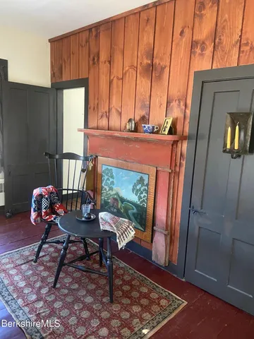 a bed room with a bed and a dresser