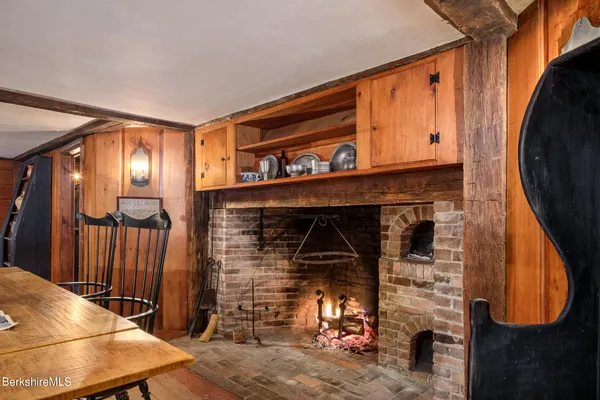 a view of a livingroom with furniture and staircase