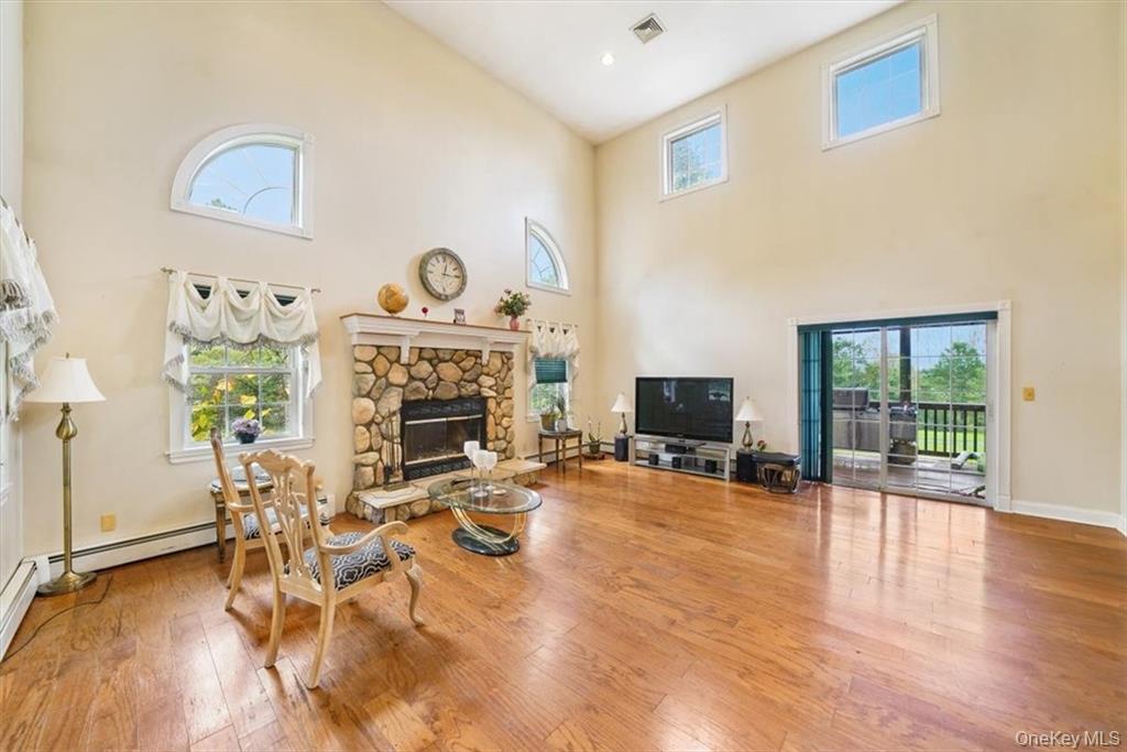 2 Bruyn Avenue Pine Bush, NY 12566 - Photo 3 of 9 a view of a livingroom with furniture and a fireplace