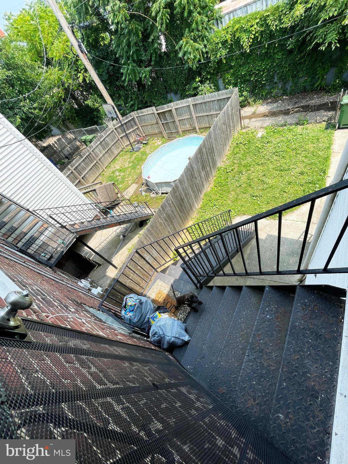3609 Brooklyn Avenue Baltimore, MD 21225 - Photo 40 of 41 a view of a balcony with chairs