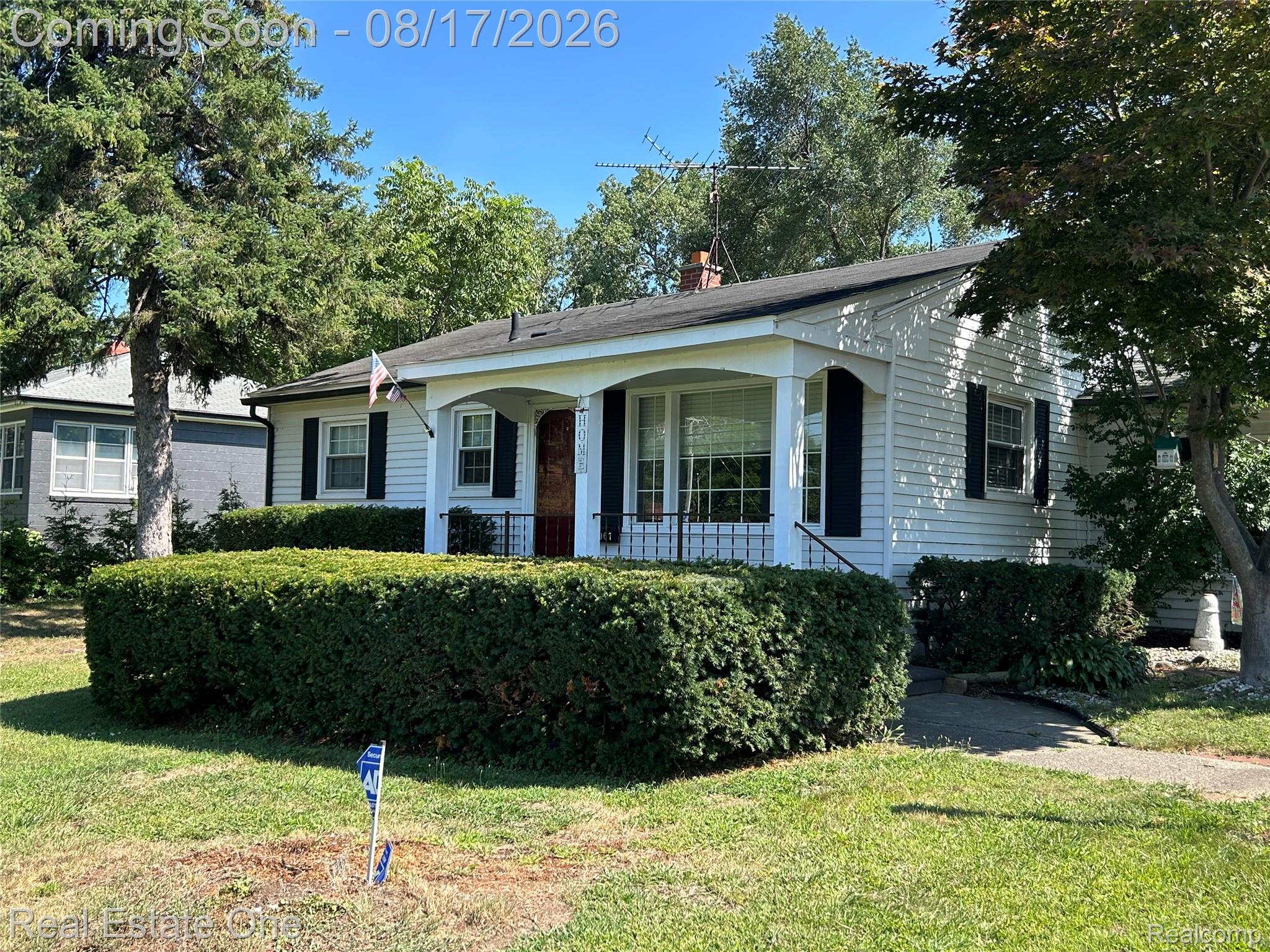 22967 Northline Road Taylor, MI 48180 - Photo 2 of 22 White siding exterior with black shutters