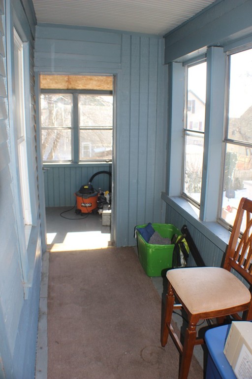 43 Farmland Road Lowell, MA 01850 - Photo 12 of 27 a room with furniture and a window