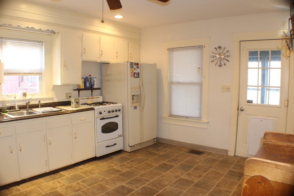 43 Farmland Road Lowell, MA 01850 - Photo 17 of 27 a view of a kitchen with electric appliances