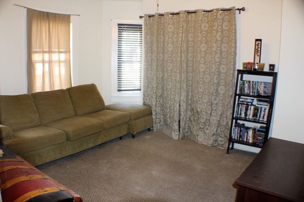 43 Farmland Road Lowell, MA 01850 - Photo 21 of 27 a living room with furniture and a window