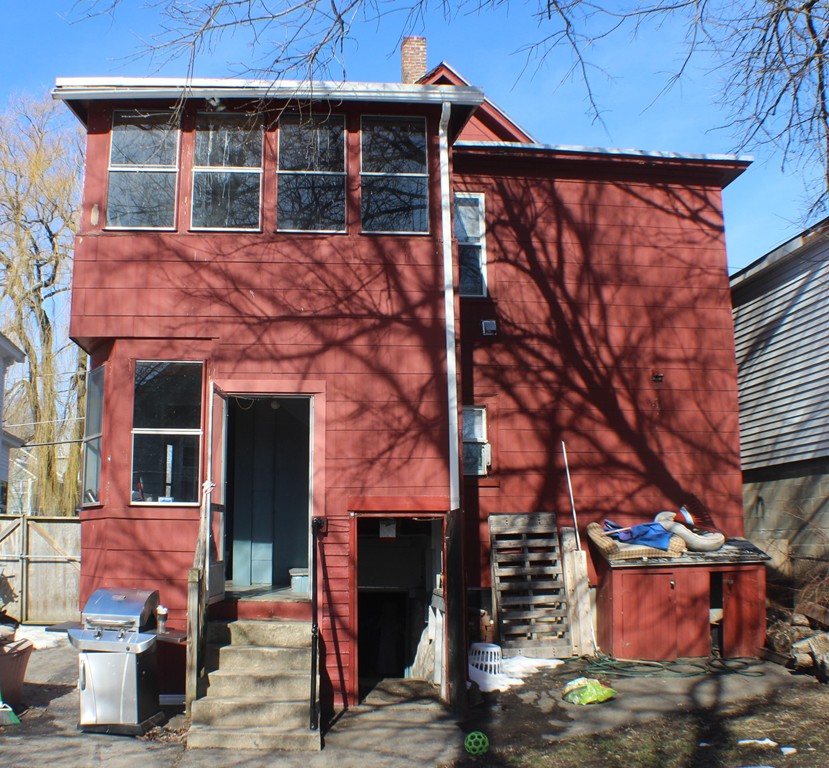 43 Farmland Road Lowell, MA 01850 - Photo 27 of 27 a front view of a house with street