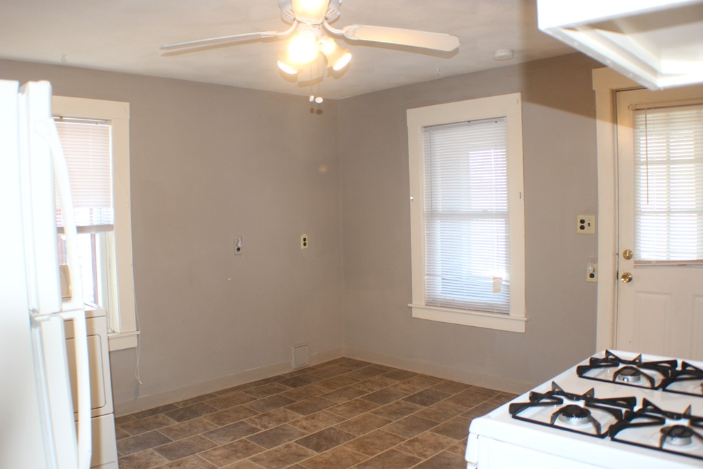 43 Farmland Road Lowell, MA 01850 - Photo 6 of 27 a view of a room with wooden floor and windows