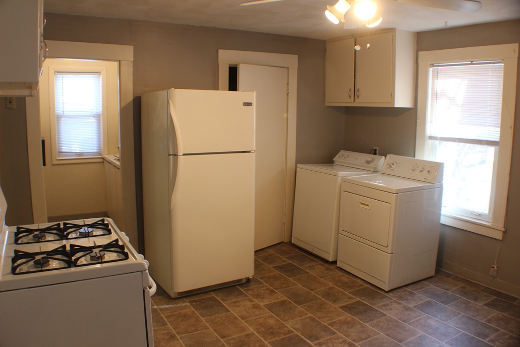 43 Farmland Road Lowell, MA 01850 - Photo 9 of 27 a utility room with dryer and washer
