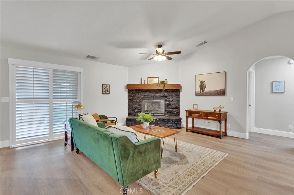 11410 Cibola Road Apple Valley, CA 92308 - Photo 12 of 45 a living room with furniture and a wooden floor