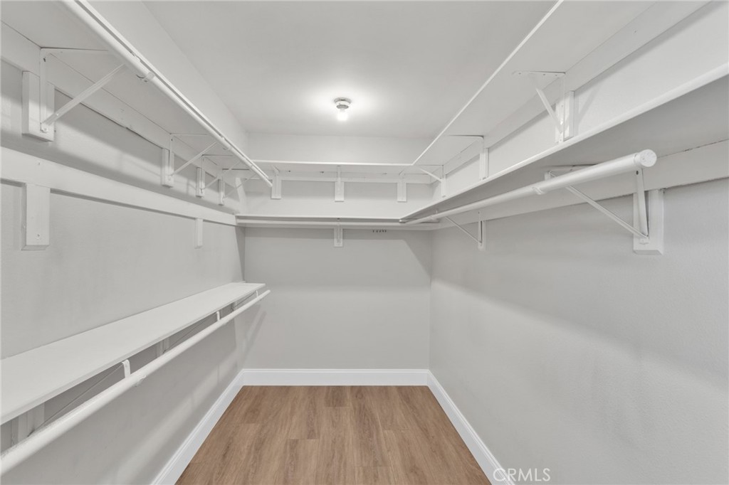 11410 Cibola Road Apple Valley, CA 92308 - Photo 25 of 45 a view of a room with wooden floor