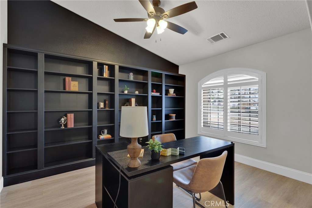 11410 Cibola Road Apple Valley, CA 92308 - Photo 7 of 45 a table room with furniture and a window
