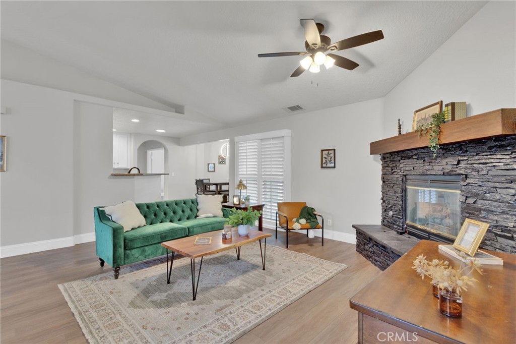 11410 Cibola Road Apple Valley, CA 92308 - Photo 10 of 45 a living room with furniture and a fireplace