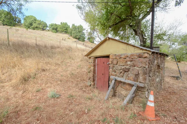 a house with trees in front of it