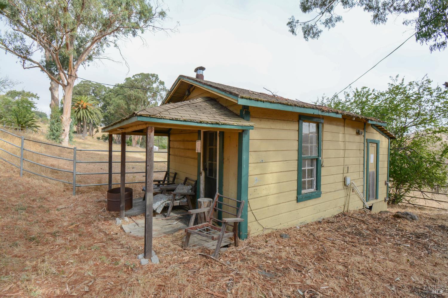 1 St Johns Mine Road Vallejo, CA 94591 - Photo 17 of 40 a backyard of a house with table and chairs