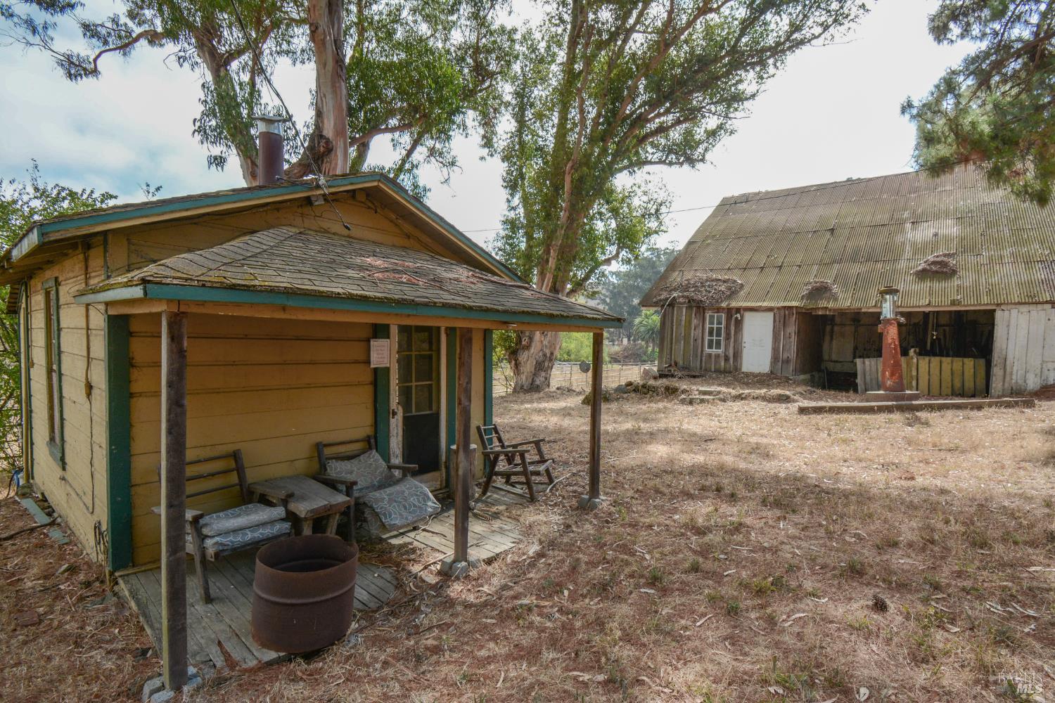 1 St Johns Mine Road Vallejo, CA 94591 - Photo 19 of 40 a view of a house with backyard and chairs