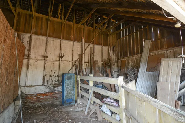 a view of a house with pool and a yard