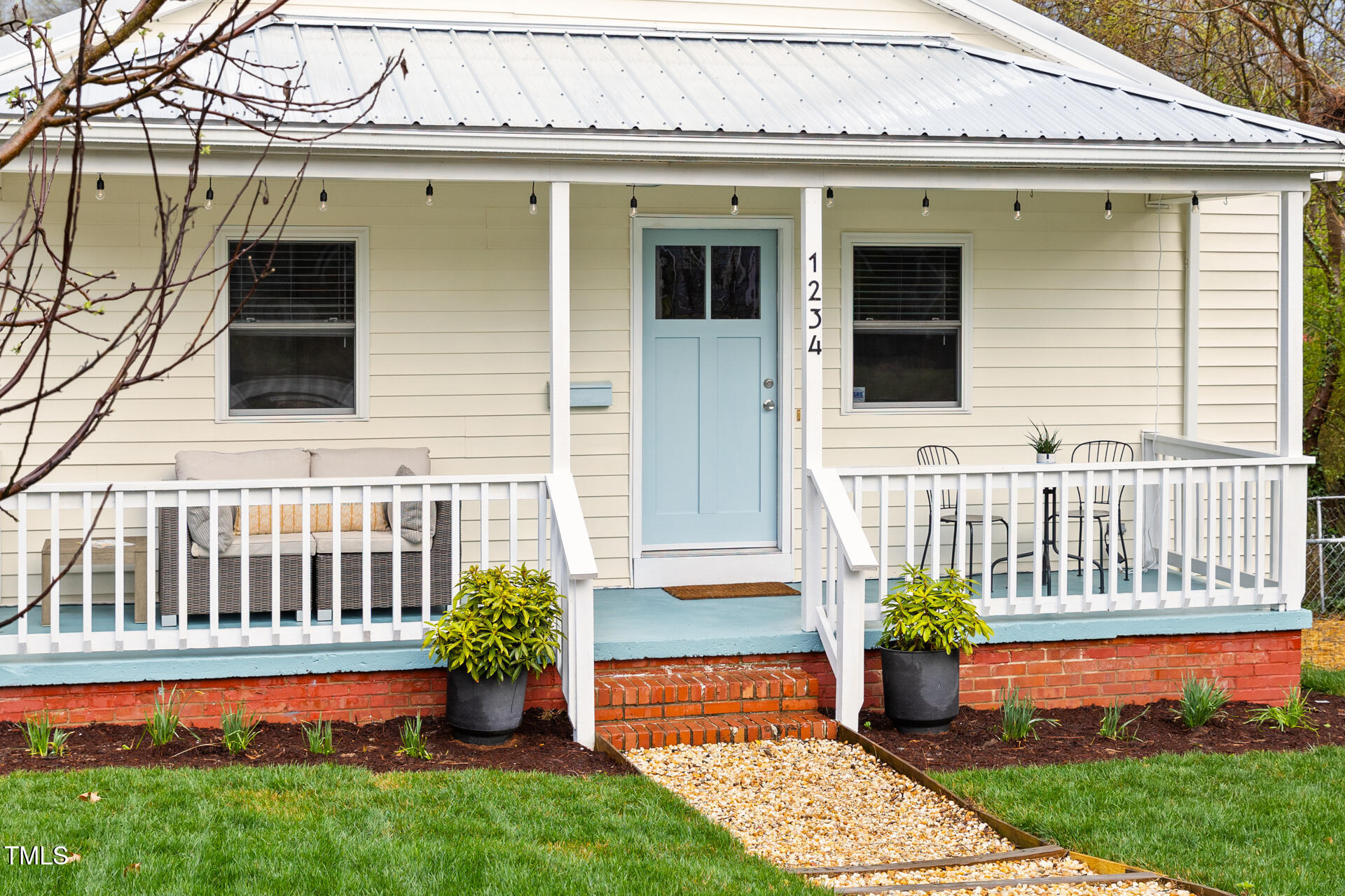 1234 Berkeley Street Durham, NC 27705 - Photo 10 of 46 a front view of a house having yard