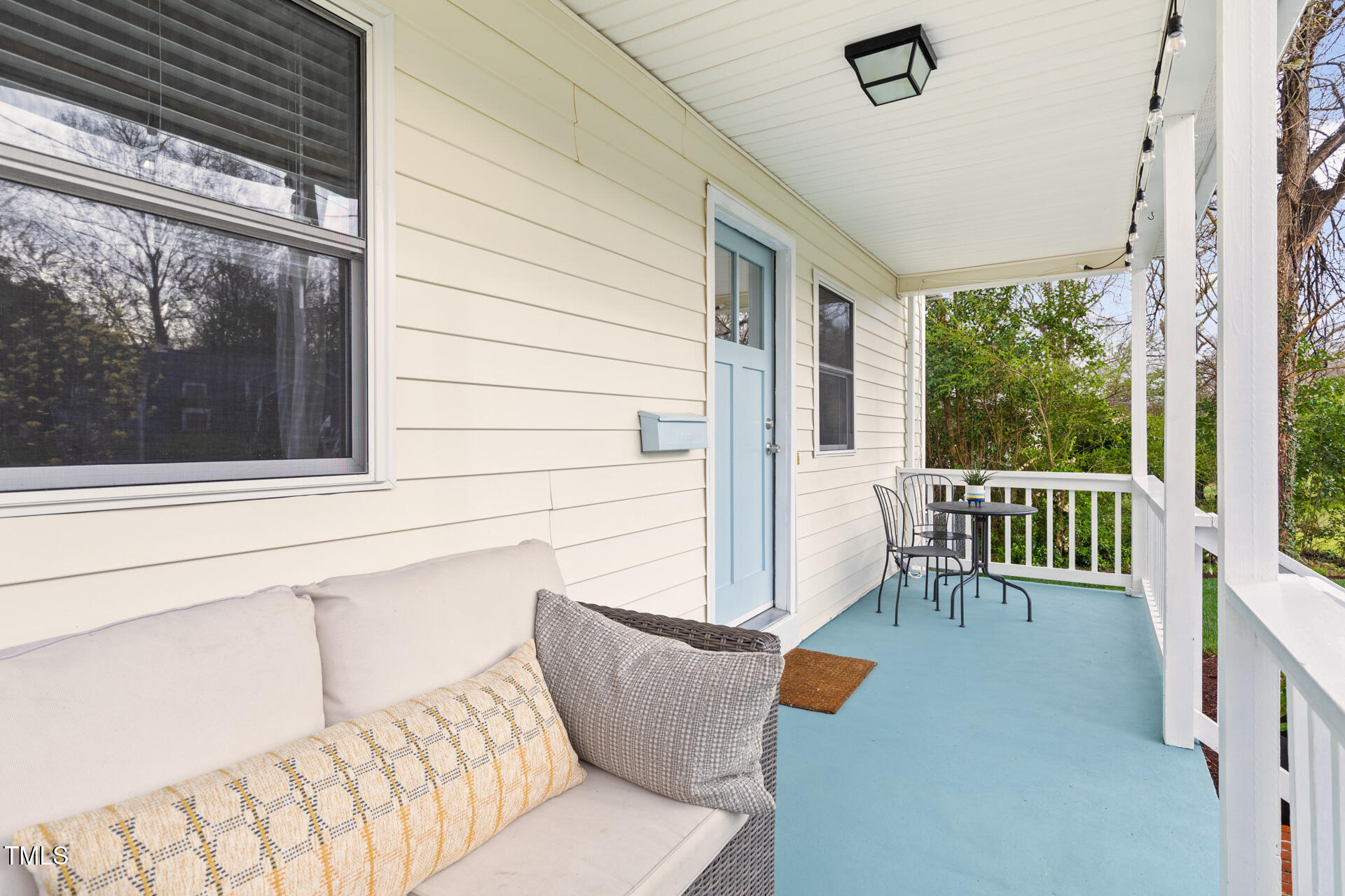 1234 Berkeley Street Durham, NC 27705 - Photo 11 of 46 a balcony with furniture and garden