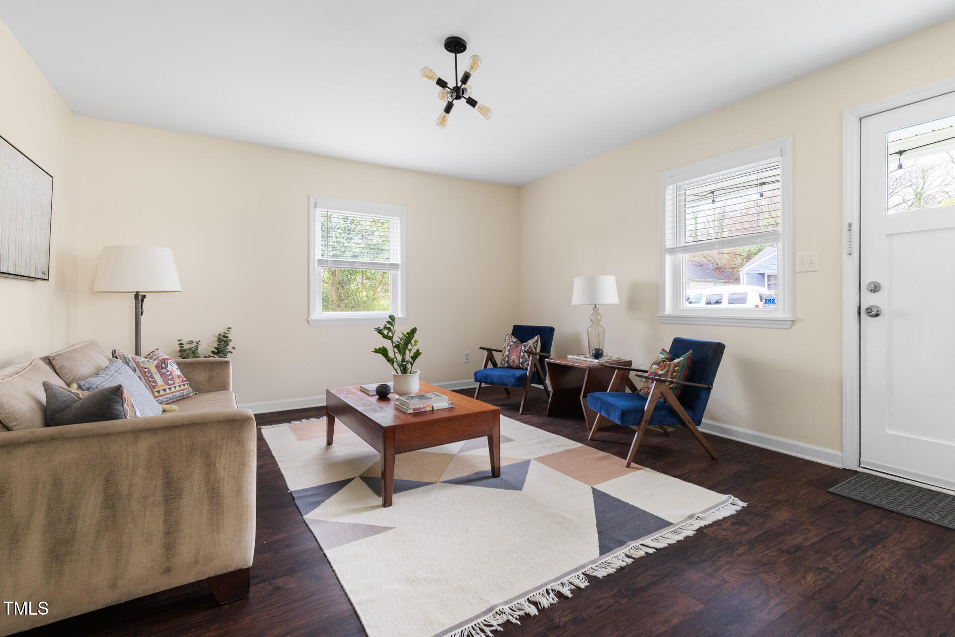 1234 Berkeley Street Durham, NC 27705 - Photo 13 of 46 a living room with furniture and a window