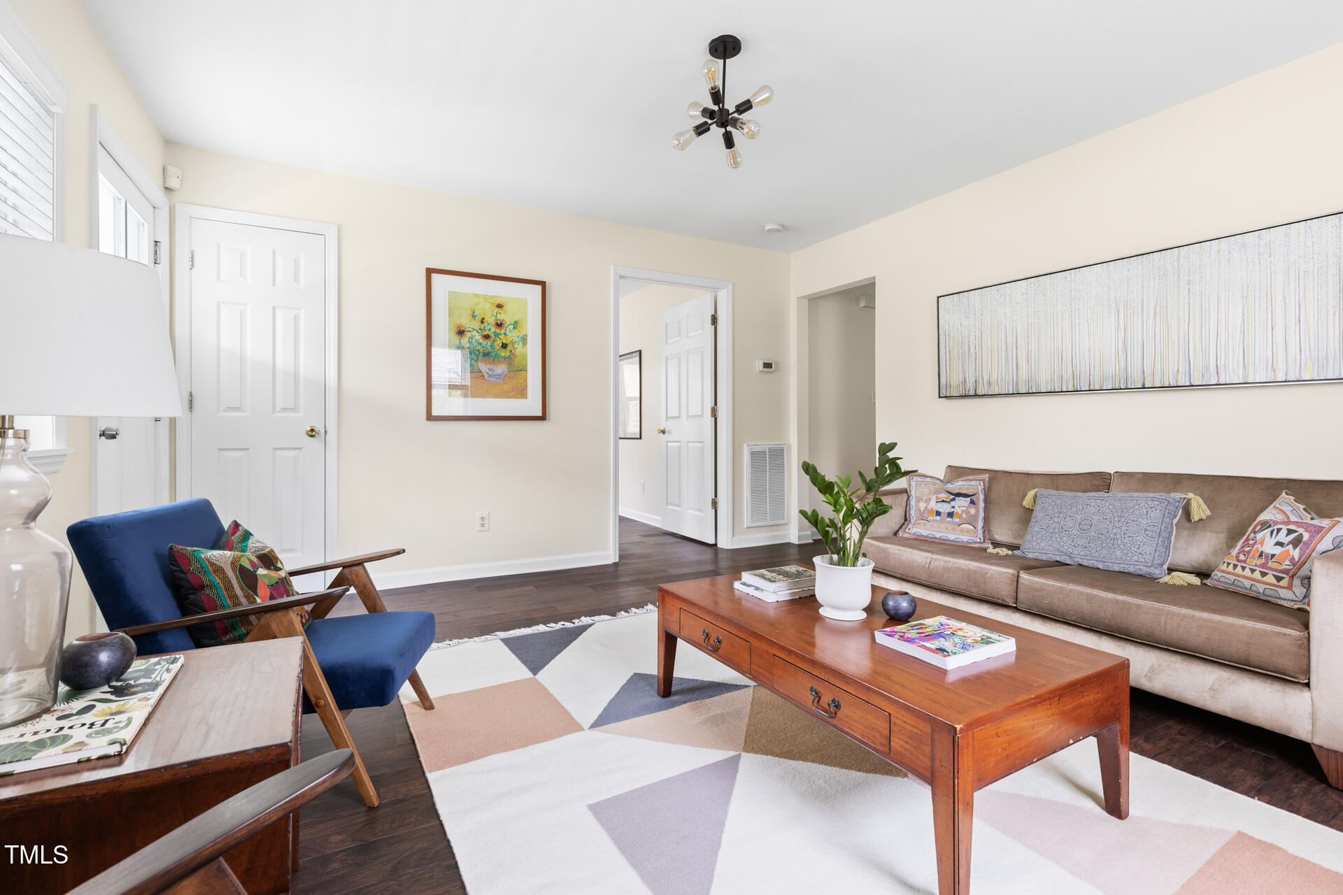1234 Berkeley Street Durham, NC 27705 - Photo 14 of 46 a living room with furniture and wooden floor