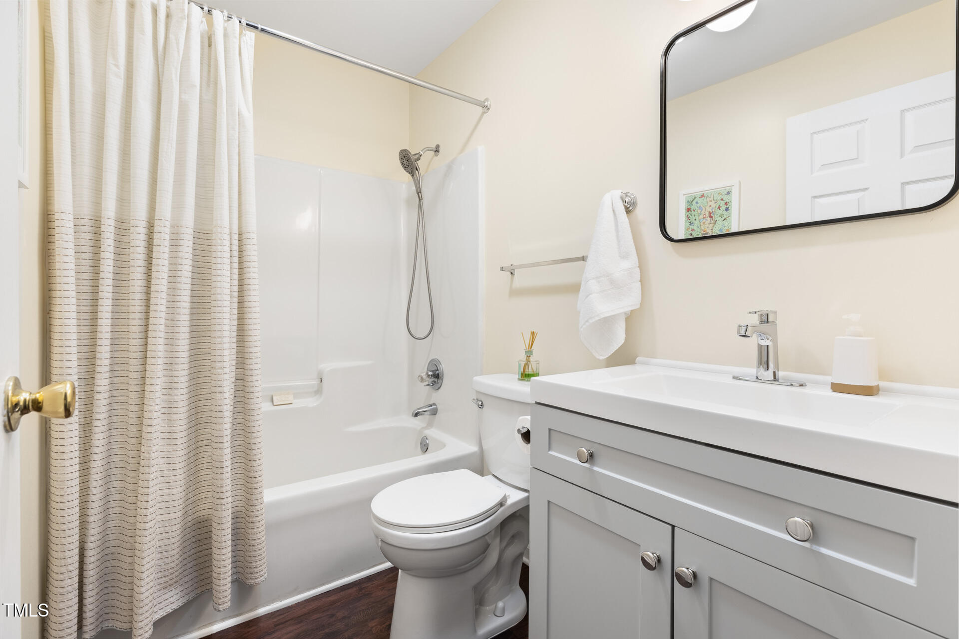 1234 Berkeley Street Durham, NC 27705 - Photo 16 of 46 a bathroom with a sink a toilet and shower