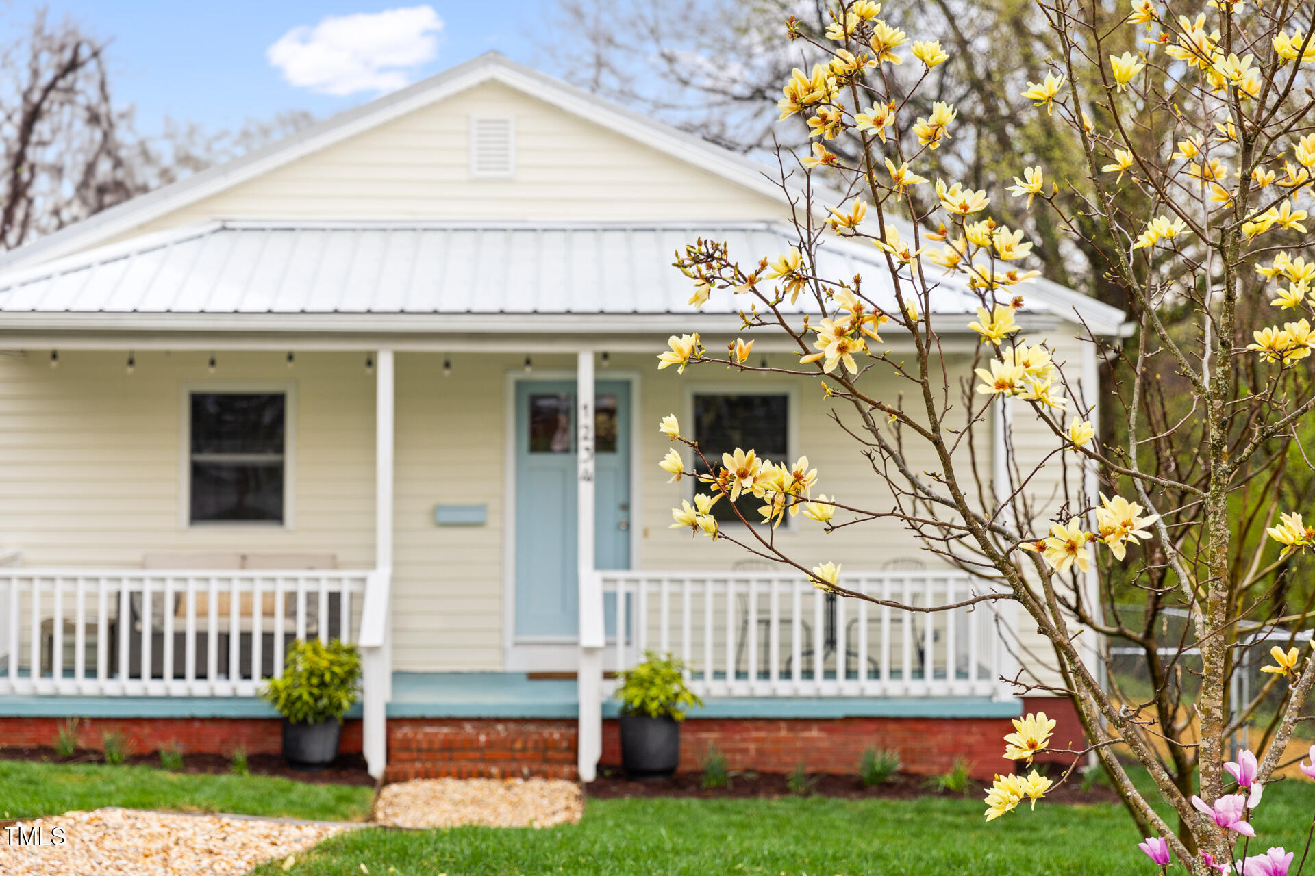 1234 Berkeley Street Durham, NC 27705 - Photo 2 of 46 a front view of a house with garden