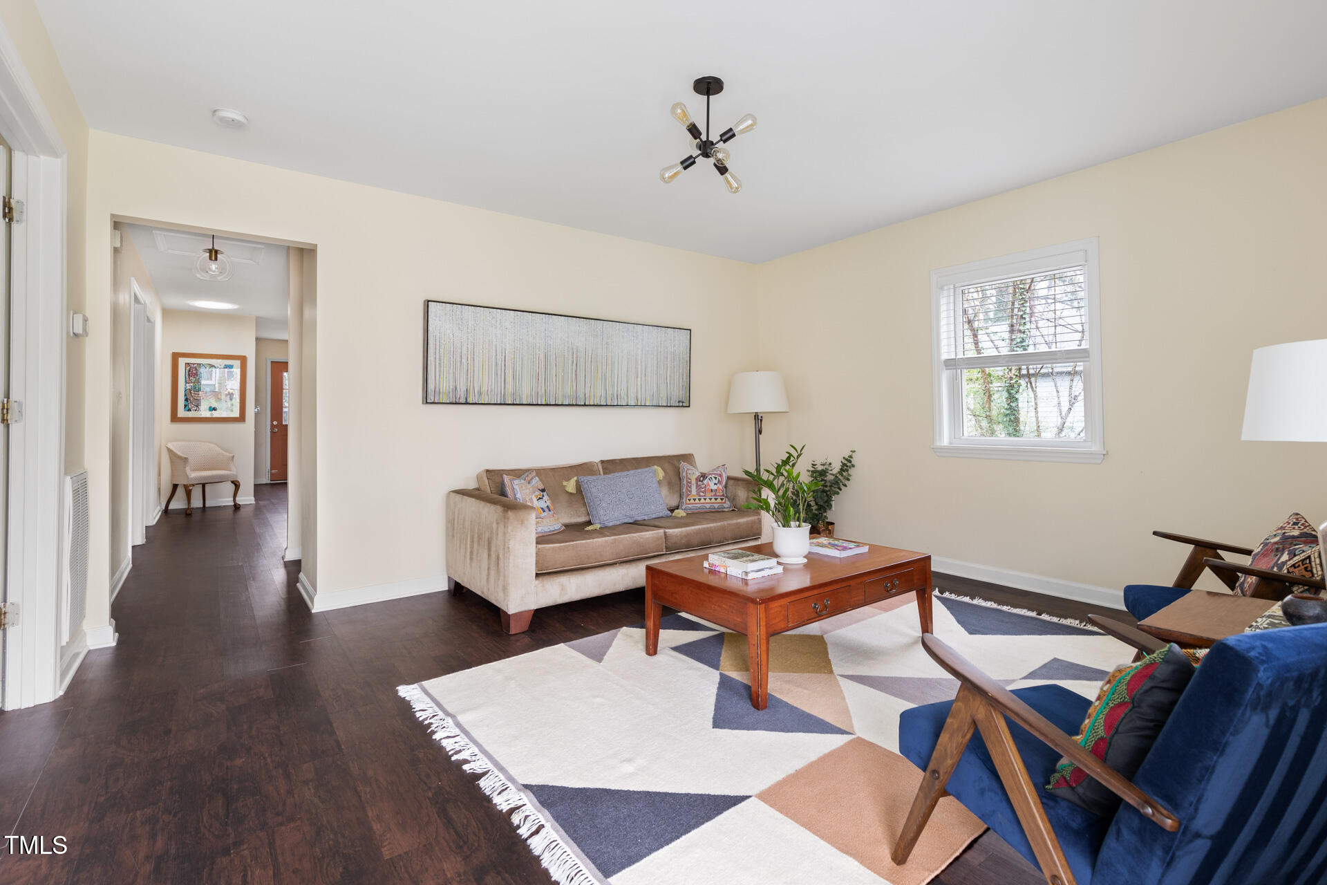 1234 Berkeley Street Durham, NC 27705 - Photo 3 of 46 a living room with furniture and wooden floor