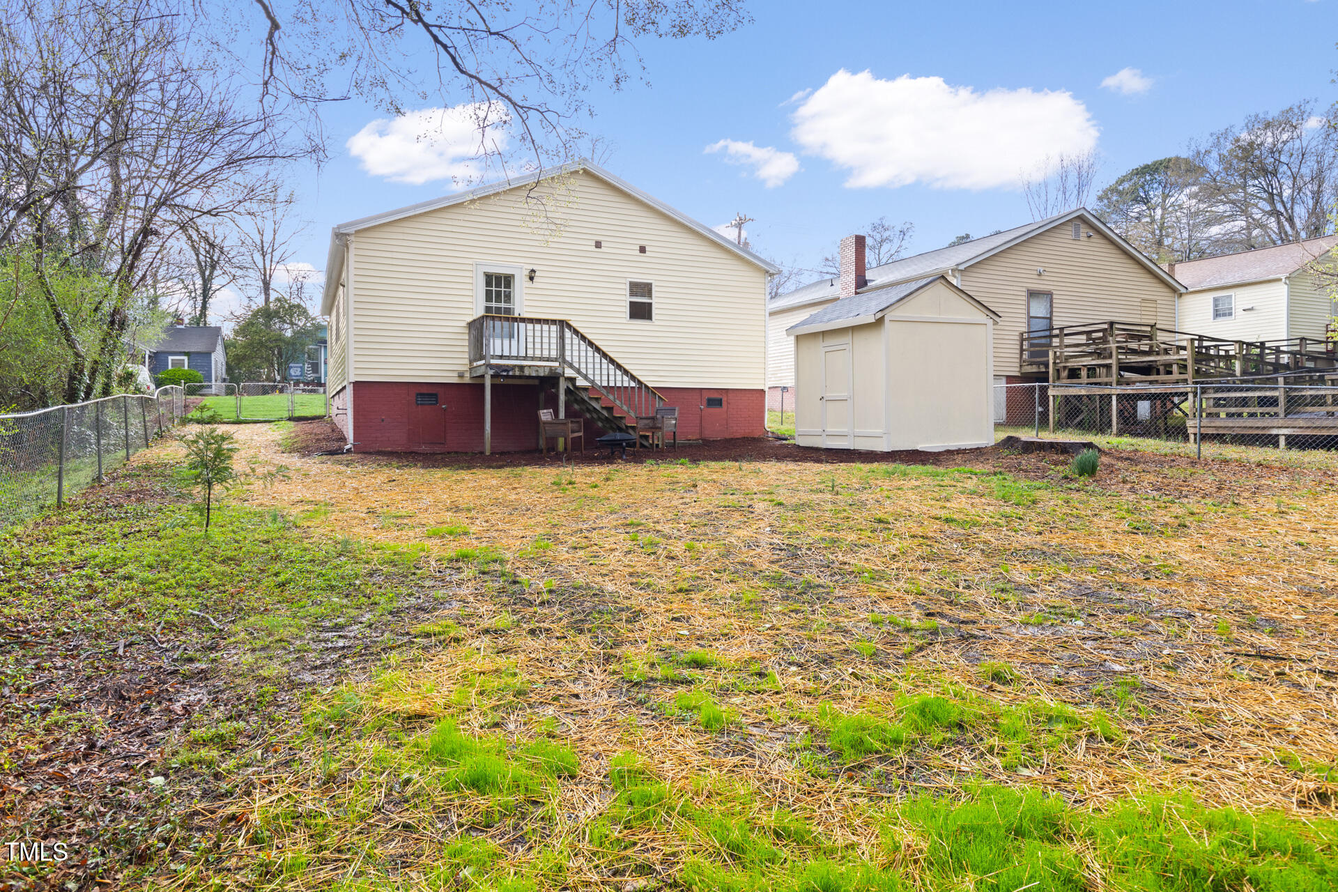 1234 Berkeley Street Durham, NC 27705 - Photo 44 of 46 a view of a house with a yard and sitting area