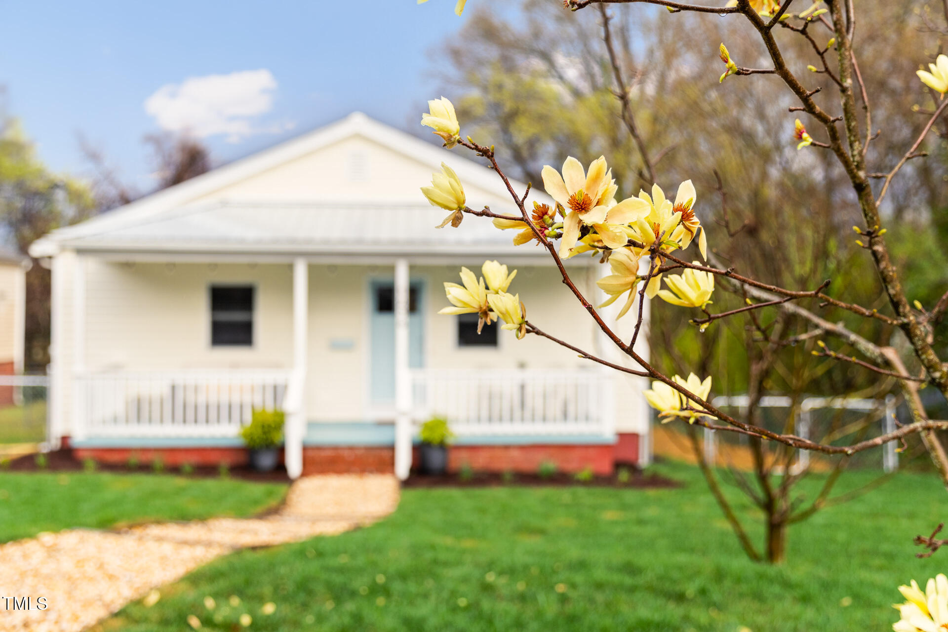 1234 Berkeley Street Durham, NC 27705 - Photo 6 of 46 a front view of a house with garden