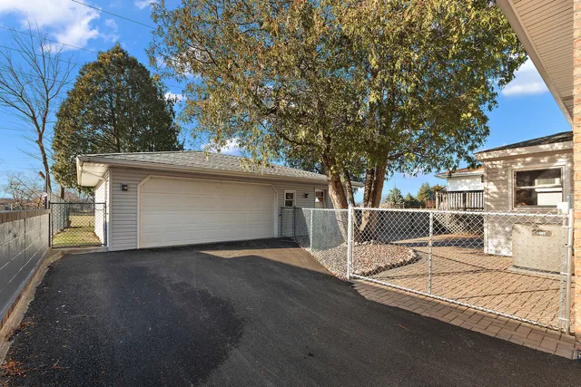 a view of backyard with a table and chair