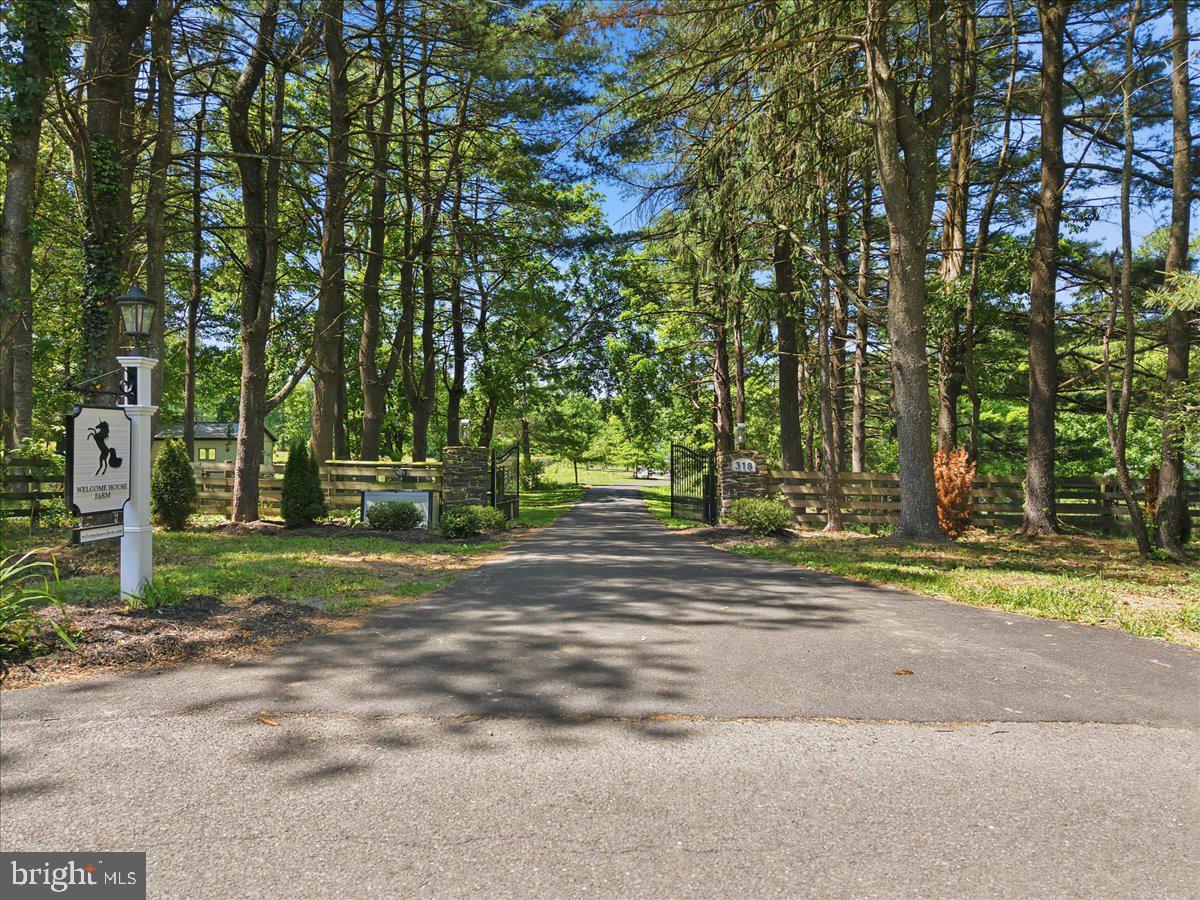 318 Welcome House Road Perkasie, PA 18944 - Photo 2 of 121 Liftmaster-powered, electrified gated entrance