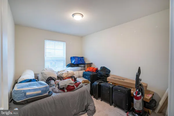 a view of a house with swimming pool in front of it