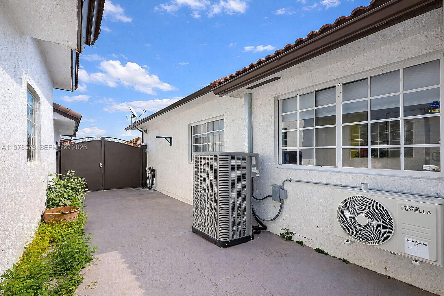 3502 Southwest 156th Court Miami, FL 33185 - Photo 33 of 47 a view of a house with a garage