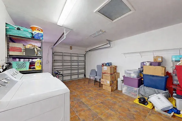 a view of a lake with a table chairs