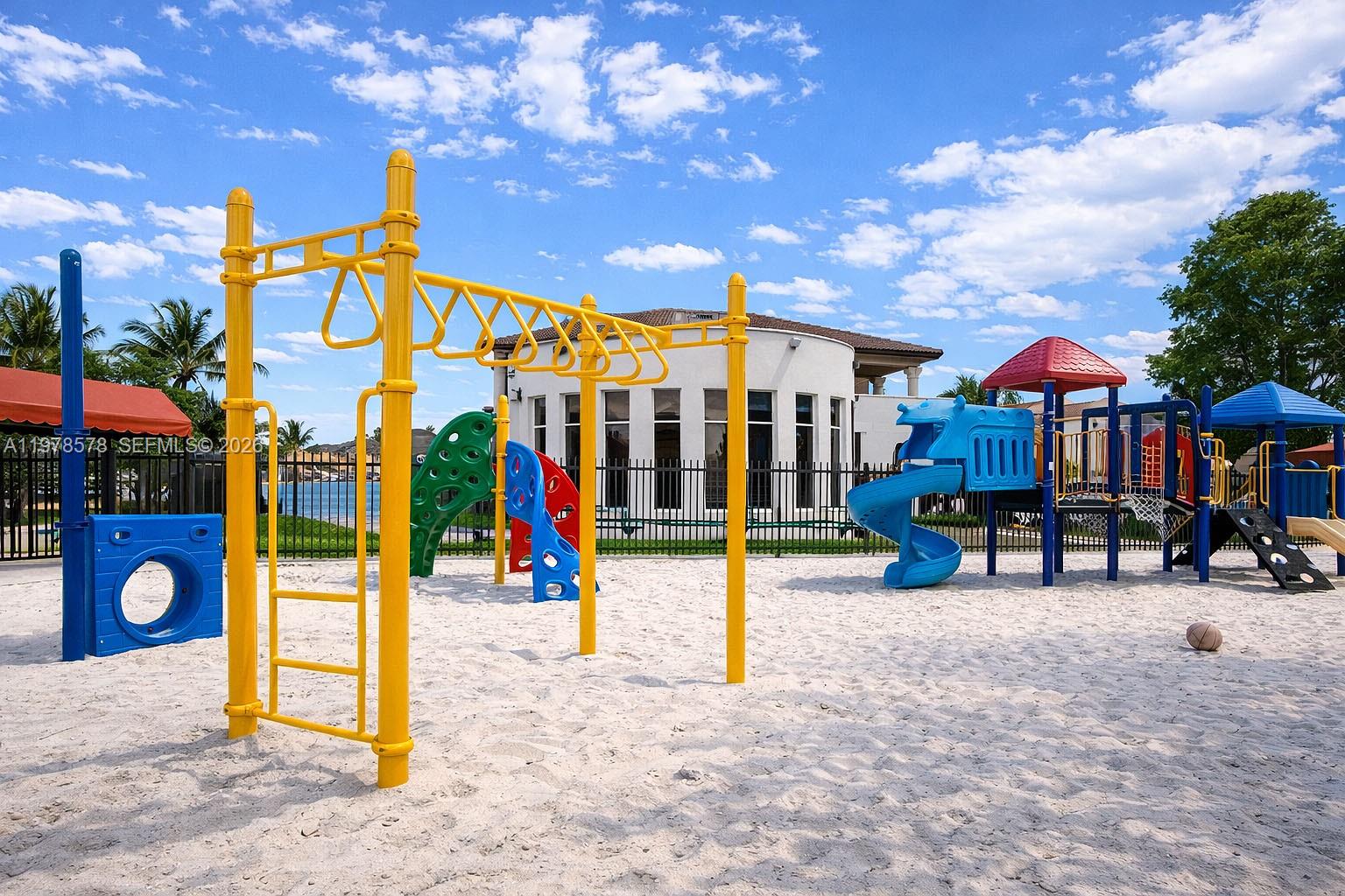 3502 Southwest 156th Court Miami, FL 33185 - Photo 47 of 47 a view of a park with swings and slides