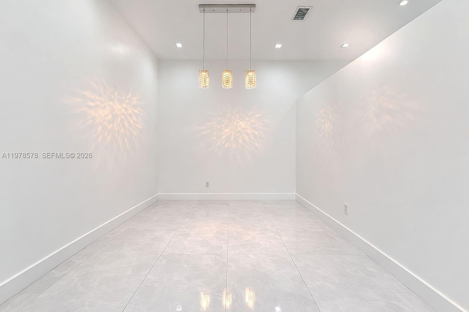 3502 Southwest 156th Court Miami, FL 33185 - Photo 9 of 47 a view of an empty room