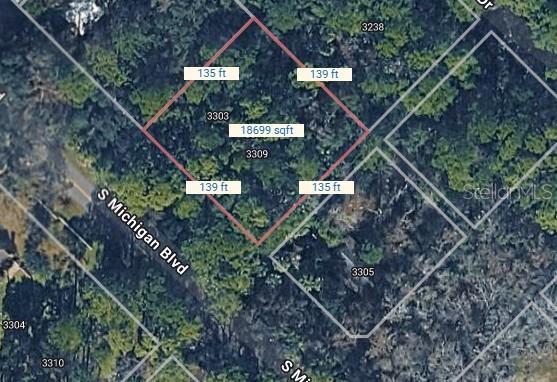 3315 South Michigan Boulevard Homosassa, FL 34448 - Photo 7 of 8 a aerial view of a house