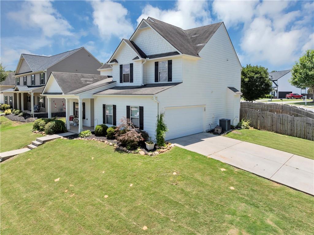 210 Creek View Lane Acworth, GA 30102 - Photo 2 of 48 a view of a house with a yard and plants